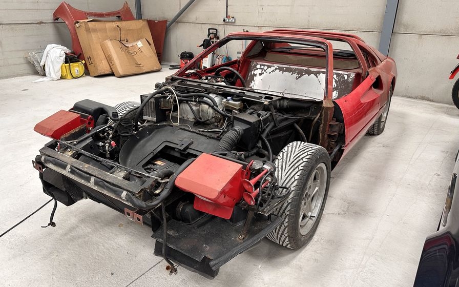 1987-ferrari-328-66002769942a7.jpg.c372336d27b4821a0361f097c2c7398b.jpg